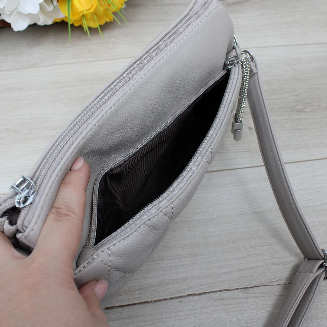 Жіноча сумка сіро-беж крос-боді містка з регульованими ремінцями для подорожей